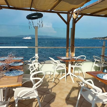 Hotel La Caletta Порто Санто Стефано Экстерьер фото