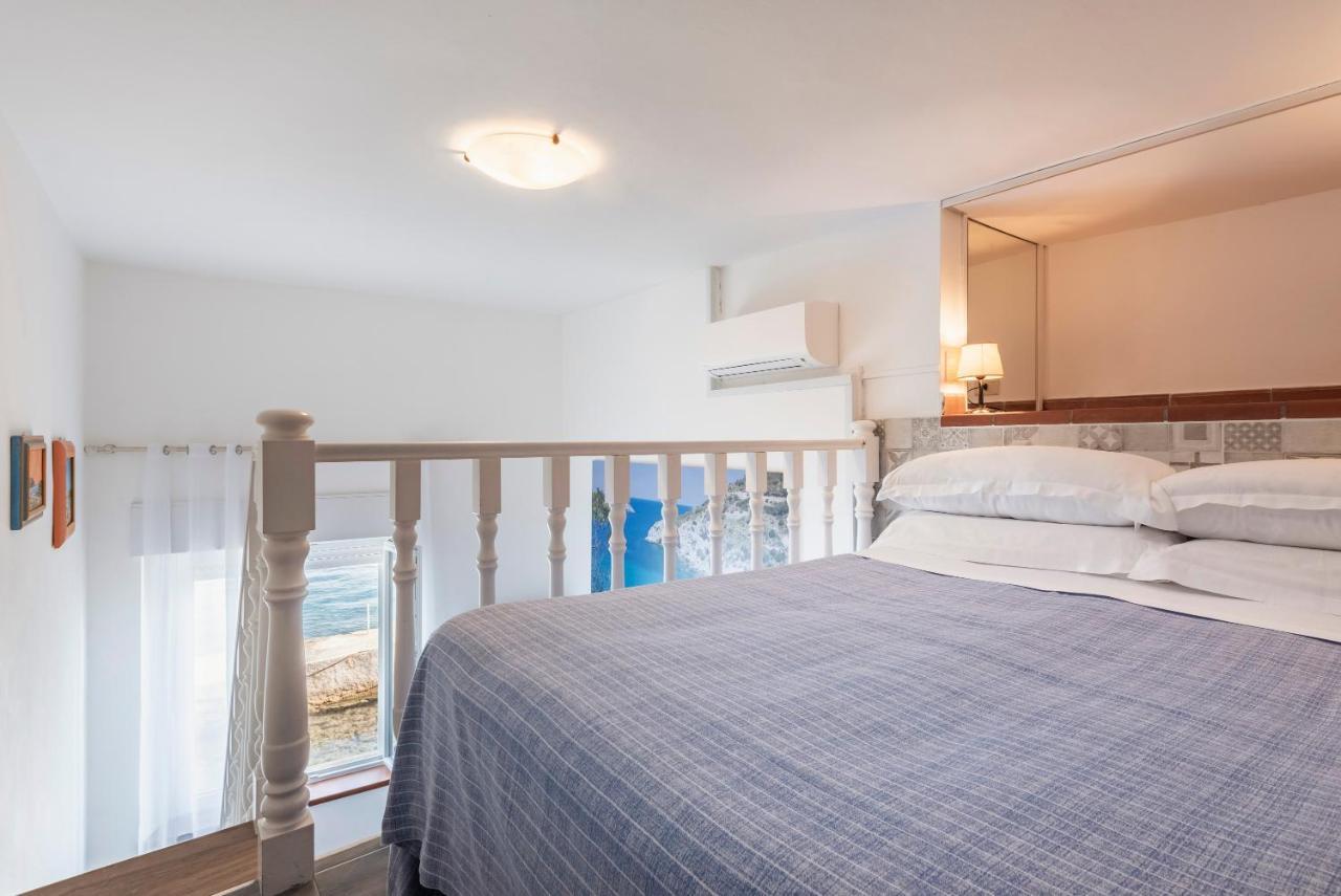Hotel La Caletta Порто Санто Стефано Экстерьер фото