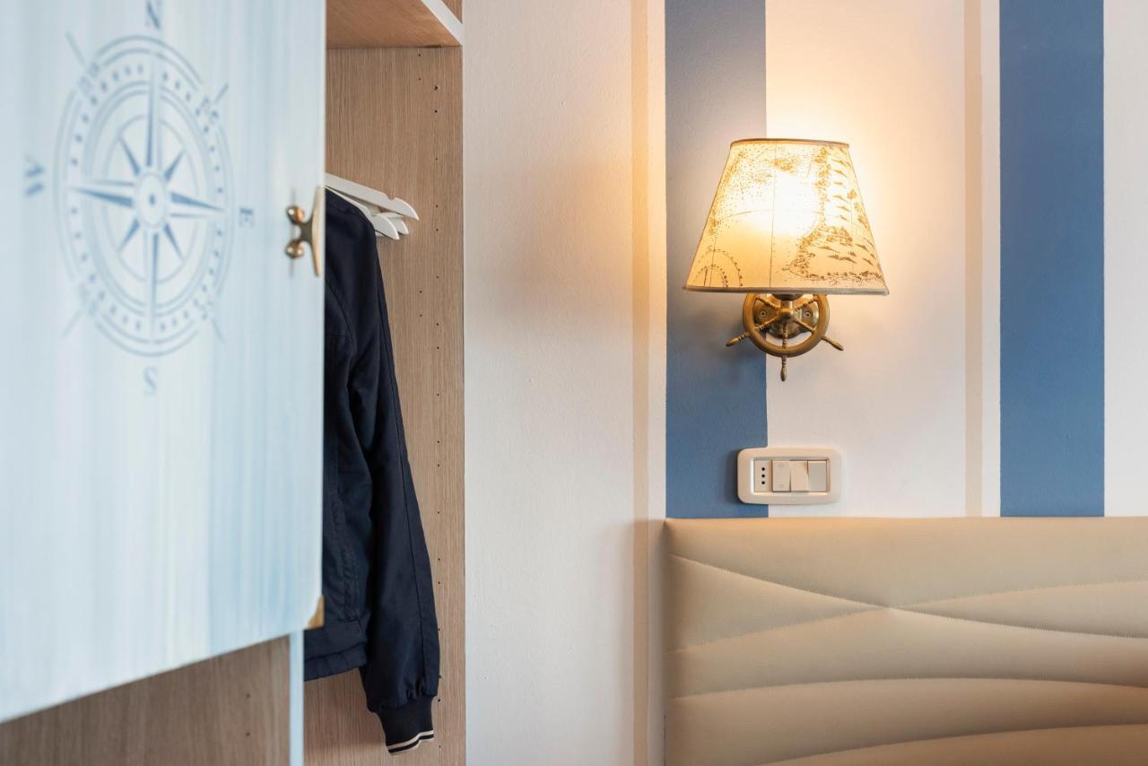 Hotel La Caletta Порто Санто Стефано Экстерьер фото