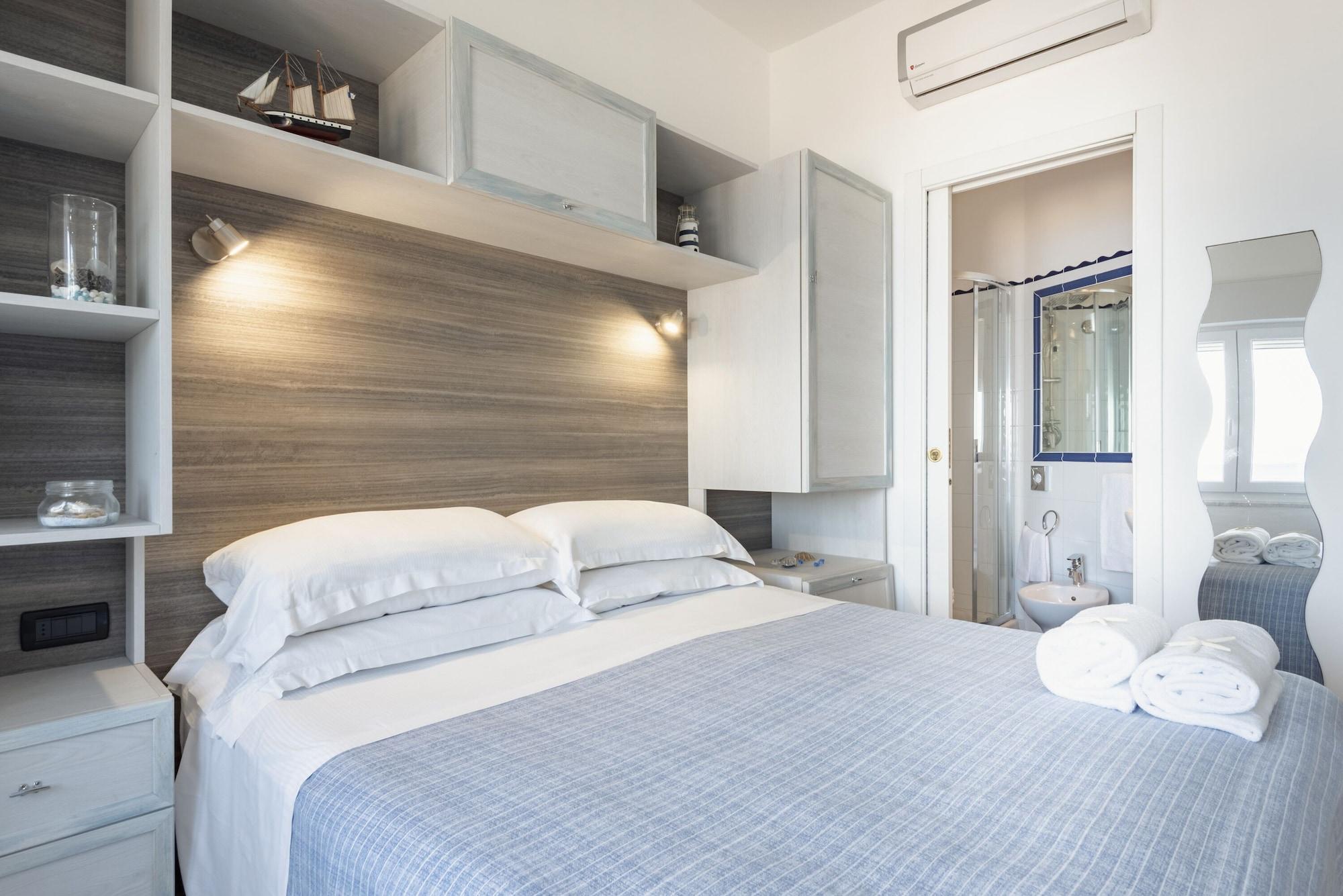 Hotel La Caletta Порто Санто Стефано Экстерьер фото