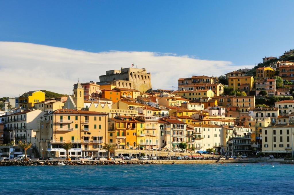 Hotel La Caletta Порто Санто Стефано Экстерьер фото