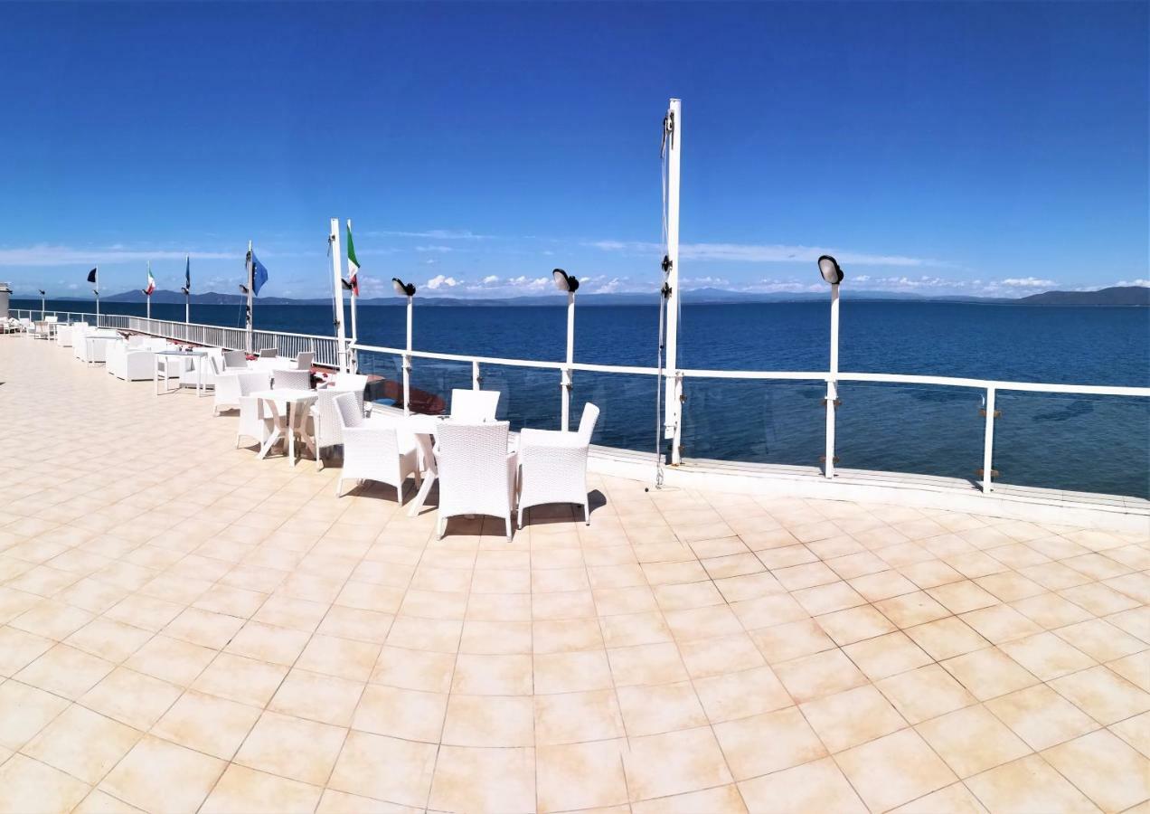 Hotel La Caletta Порто Санто Стефано Экстерьер фото
